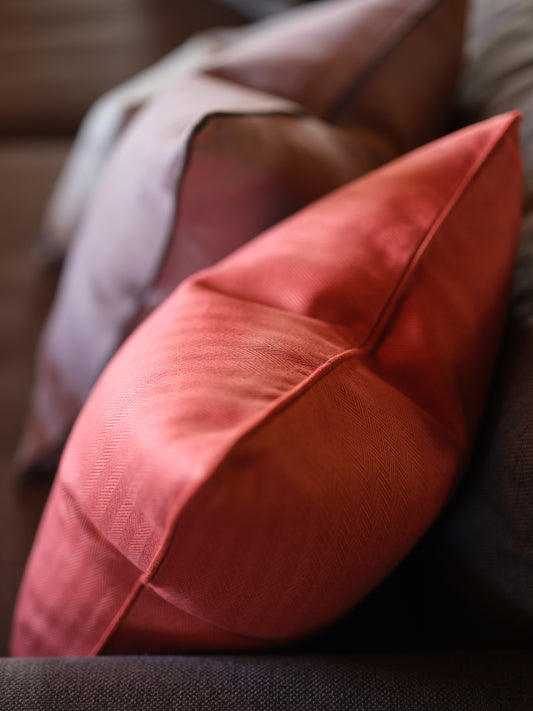 Rust herringbone piped cushion cover 50x50